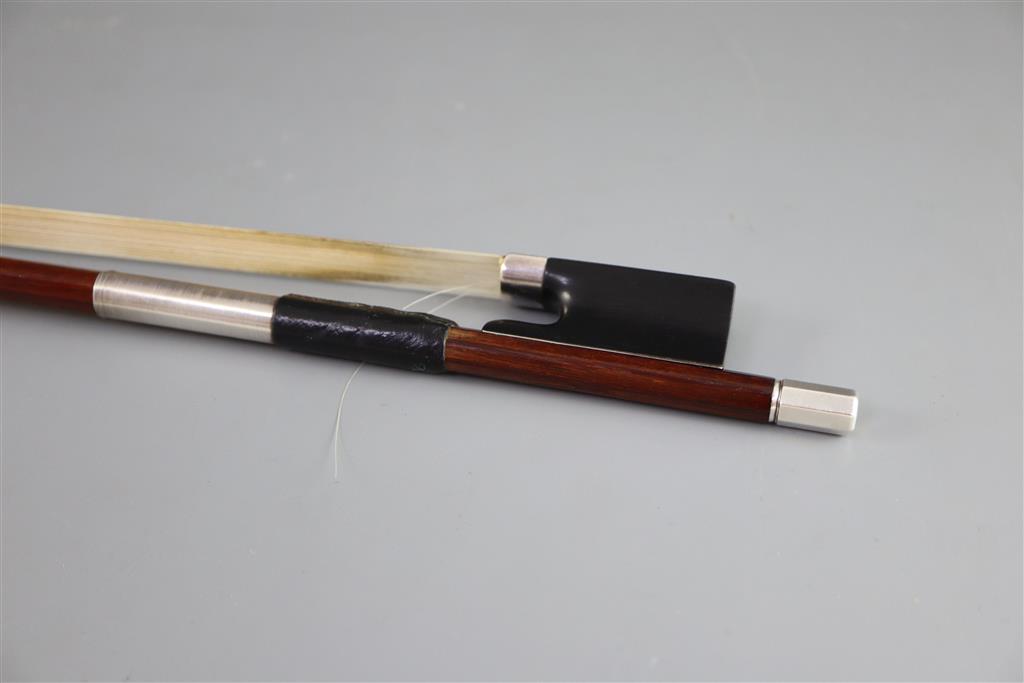 A late 19th/early 20th century silver mounted bow, unmarked, 74cm long